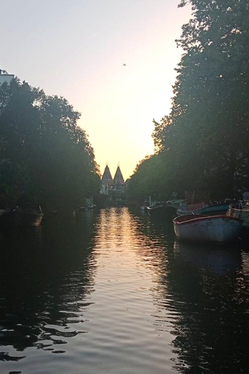 Sunset cruise on an Amsterdam canal